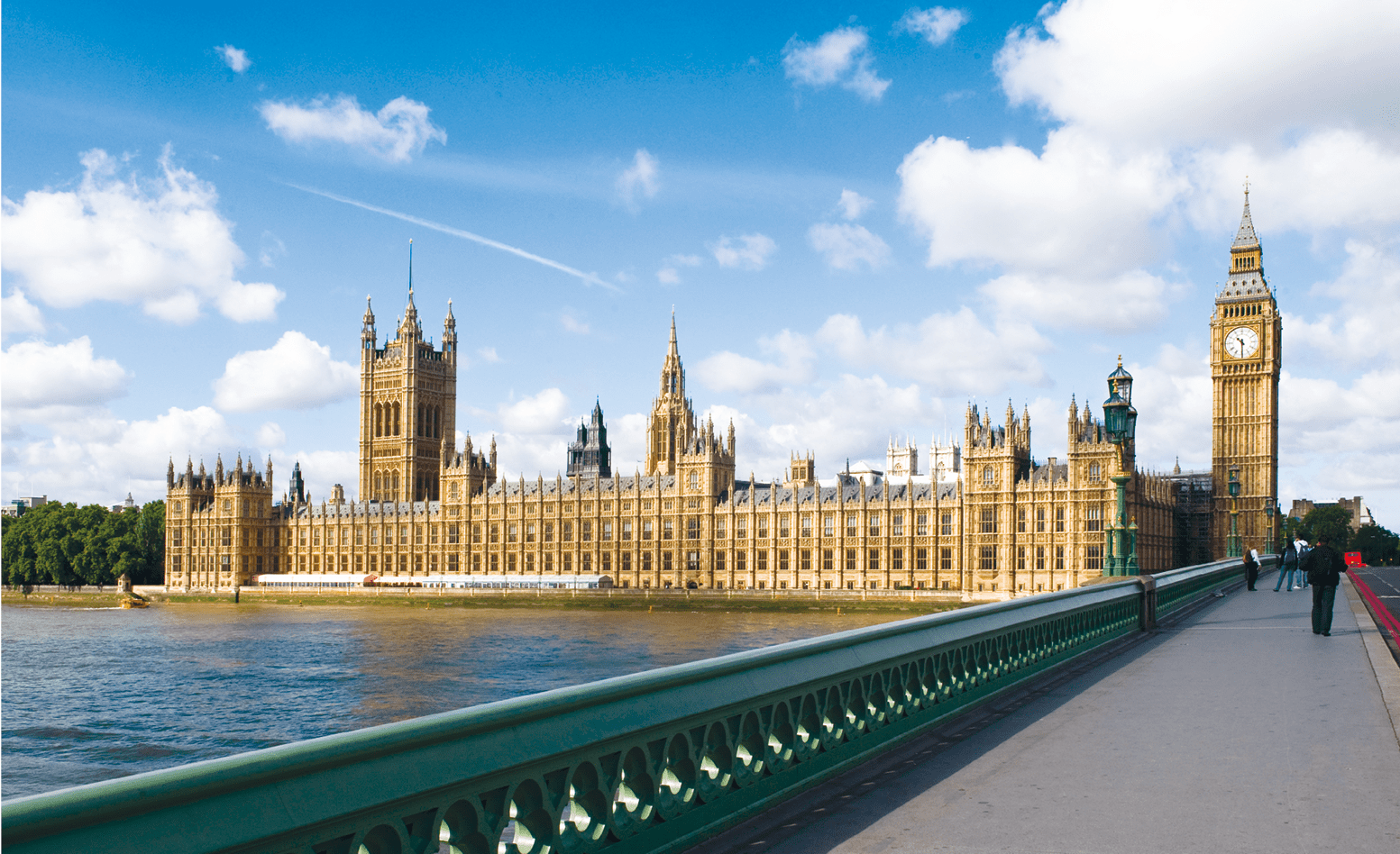 The Palace of westminster, also known as the Houses of parliament in London UK, with westminster bridge in the foreground.