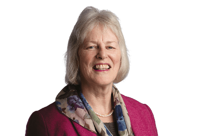 A woman wearing a pink jacket and a scarf. Description generated by AI