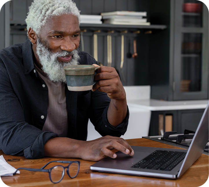 Click, Buy, Repeat: Senior Man Enjoying the Ease of Online Shopping