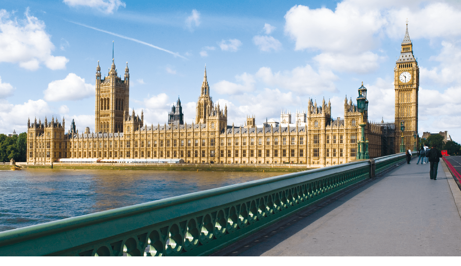 The Palace of westminster, also known as the Houses of parliament in London UK, with westminster bridge in the foreground.