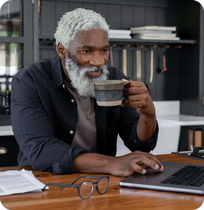 Click, Buy, Repeat: Senior Man Enjoying the Ease of Online Shopping