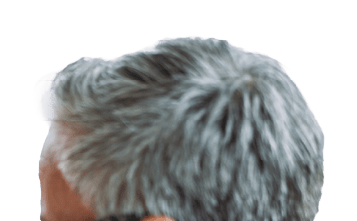 Shot of two coworkers having a discussion in modern office. Businessman and businesswoman in meeting using digital tablet and discussing business strategy. Confident business people working together in the office. Corporate business persons discussing new project and sharing ideas in the workplace.