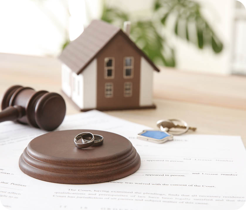 A house and a set of keys are placed on top of a piece of paper. AI generated content
