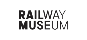 A black and white image of a train museum. AI generated content