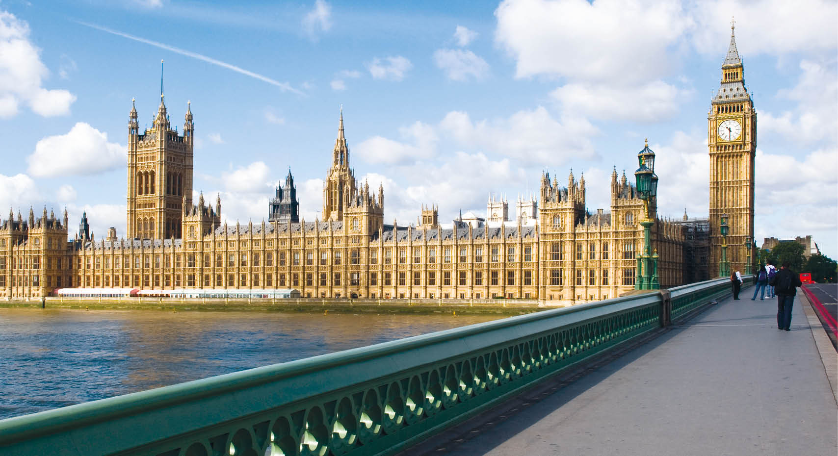 The Palace of westminster, also known as the Houses of parliament in London UK, with westminster bridge in the foreground.