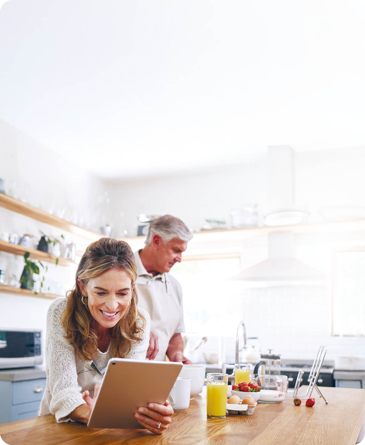 Woman, tablet and old couple in home kitchen on social media, internet surfing or reading news. Retirement, elderly husband and wife in house with 5g mobile and streaming web content on digital tech.
