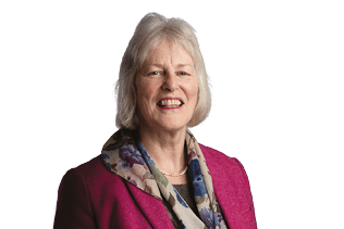A woman wearing a pink jacket and a scarf. Description generated by AI