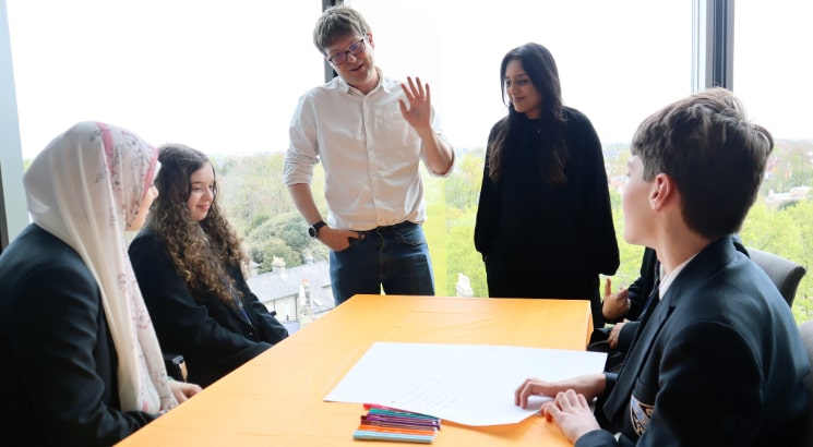 A group of school children in discussion