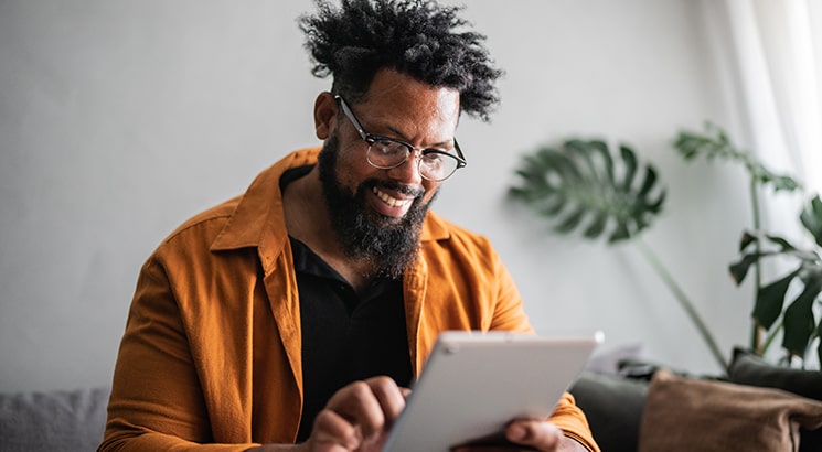 Content image_745 x 410_People_active_man on tablet-min (1)