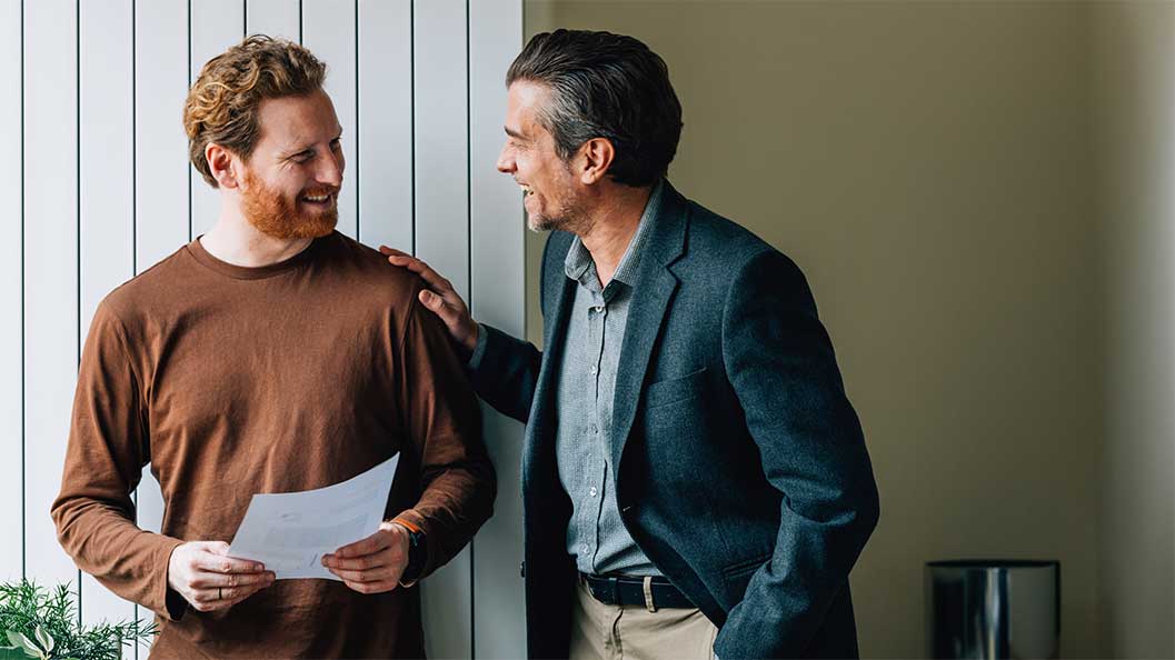 Two men chatting