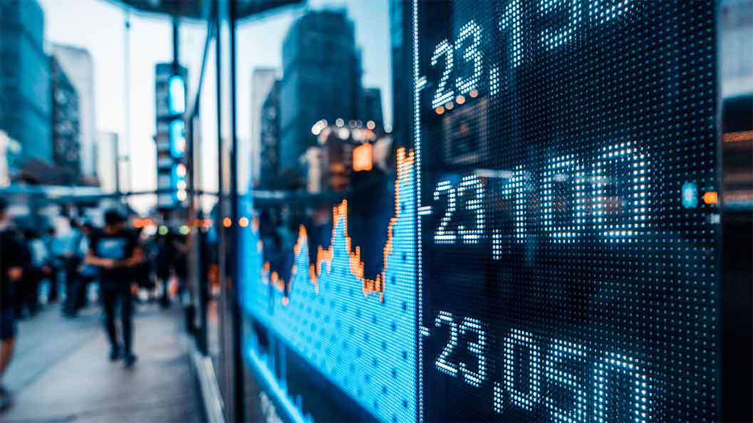 A digital stock market display showing numbers in blue