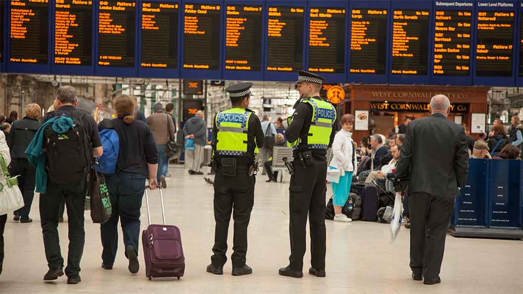 Two BTP officers at a train station