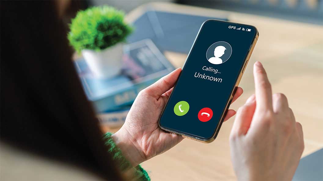 A woman holding a phone